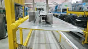Pvc window frame production line conveyer belt moving forward - Powered by Shutterstock - Get 15% off with code: PIKWIZARD15