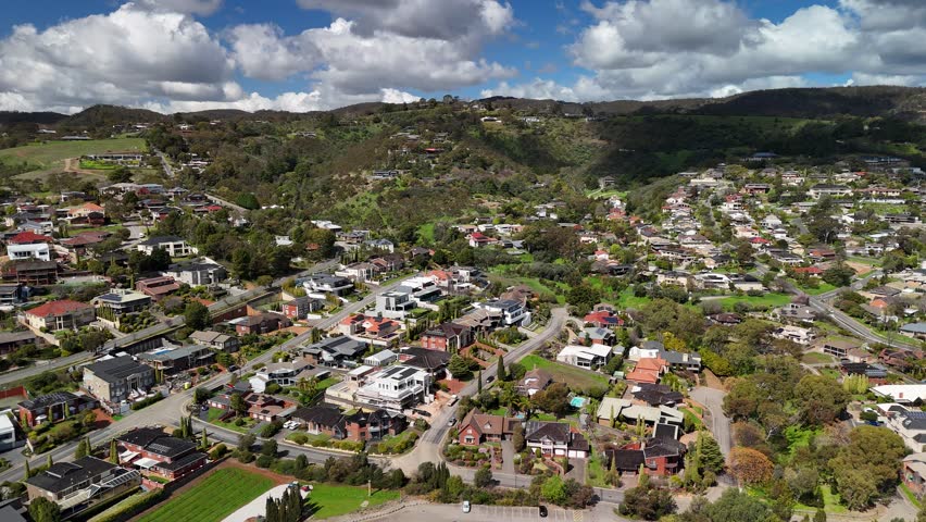 Magill and Auldana, Adelaide, South Australia: 4K Aerial Drone Footage of Residential Suburbs, Low Density Houses with Solar Panels, Gardens, Parks with Plum Blossoms and Adelaide Hills in Spring