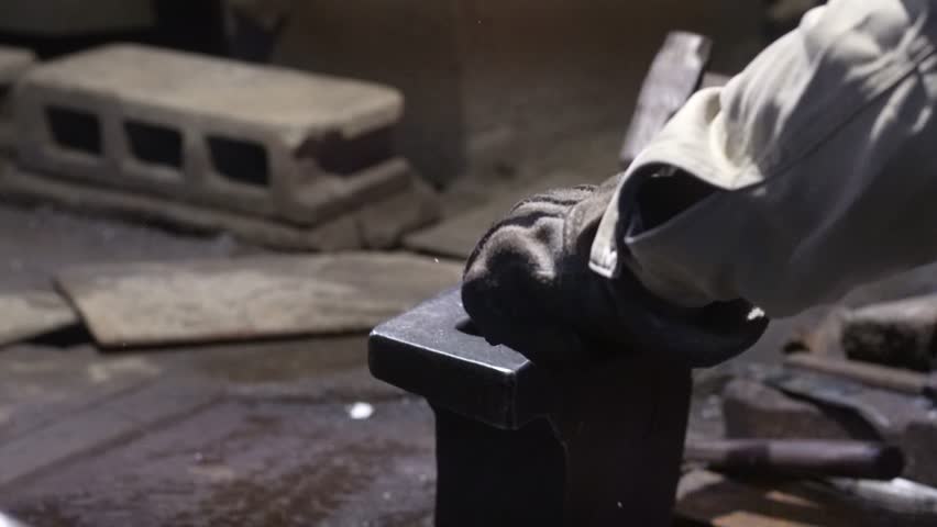 A craftsman who hammers heated materials into shapes