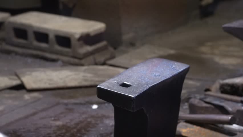 A craftsman who hammers heated materials into shapes