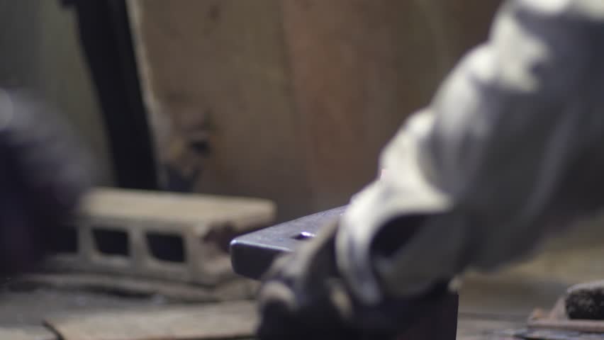 A craftsman who hammers heated materials into shapes