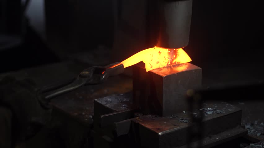 A craftsman who hammers heated materials into shapes