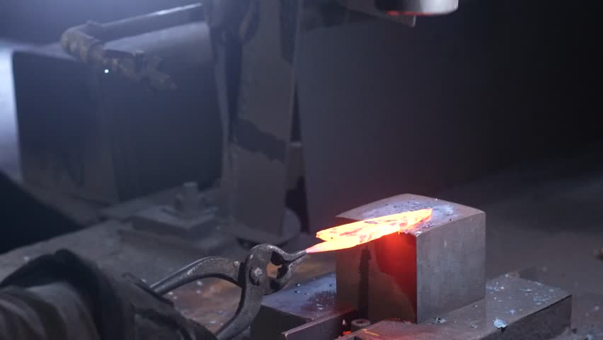 A craftsman who hammers heated materials into shapes