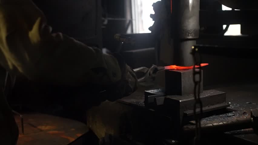 A craftsman who hammers heated materials into shapes