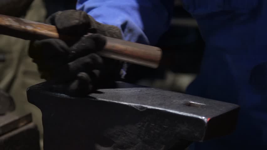 A craftsman who hammers heated materials into shapes