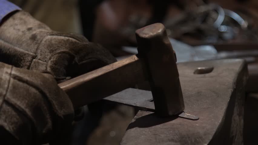A craftsman who hammers heated materials into shapes
