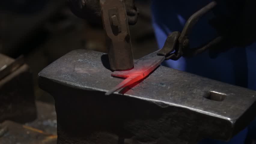 A craftsman who hammers heated materials into shapes