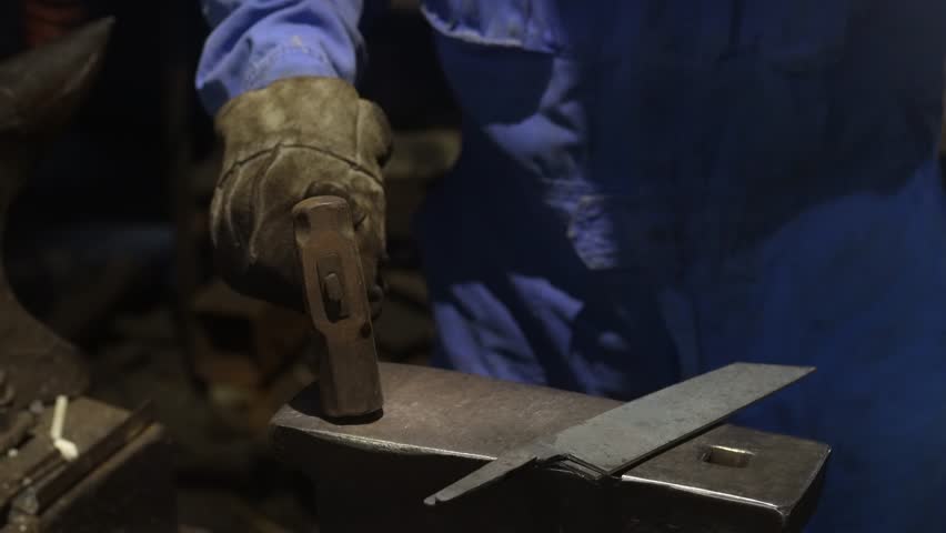 A craftsman who hammers heated materials into shapes