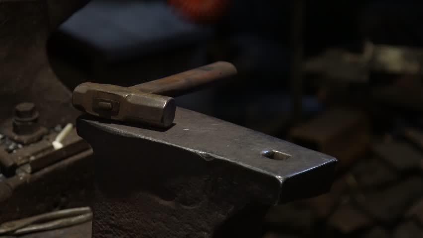 A craftsman who hammers heated materials into shapes