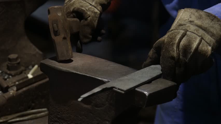 A craftsman who hammers heated materials into shapes