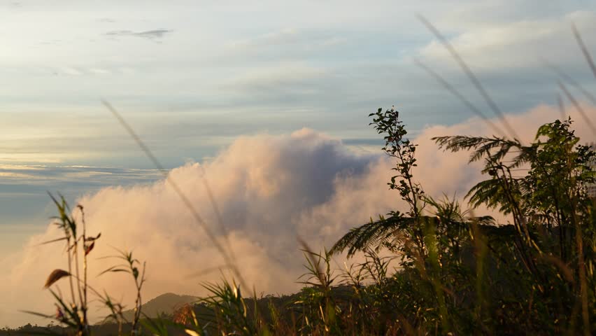 Stunning clouds rolling over genting highlands, pahang, malaysia during a beautiful sunset