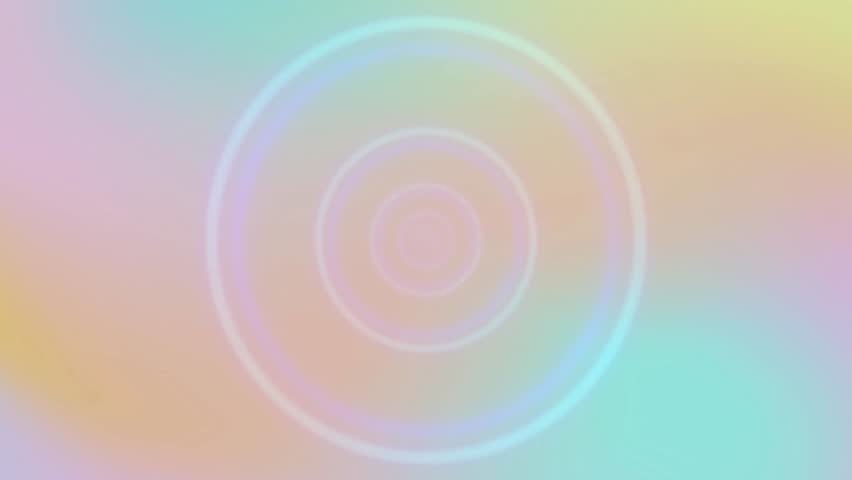 High Quality Video Footage of Geometric Circles on a Pastel Background