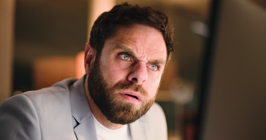 Confused, think and business man with computer with glitch, error or financial mistake at night. Tech, reading and puzzled broker with stress for investment deadline, wtf or problem solving in office