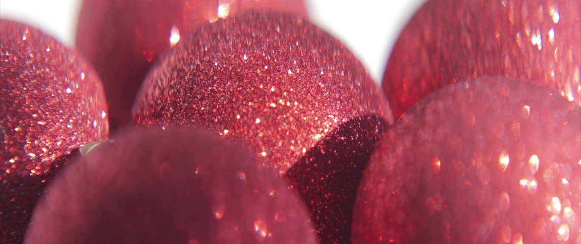 Christmas balls with red sequins 4K anamorphic sliding footage