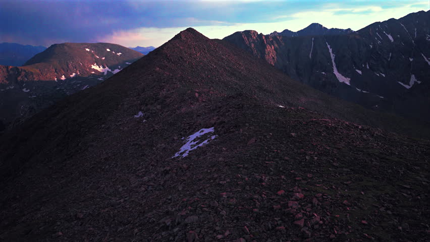 Notch Mountain Shelter Halo Ridge landscape view of Mount of the Holy Cross wilderness aerial drone Colorado summer golden hour sunset clouds Rocky Mountains Sawatch Range forward motion