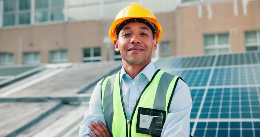 Face, solar panel engineer and happy man with confidence on roof in city for green power. Smile, renewable energy and photovoltaic technician with portrait, eco friendly electricity or sustainability