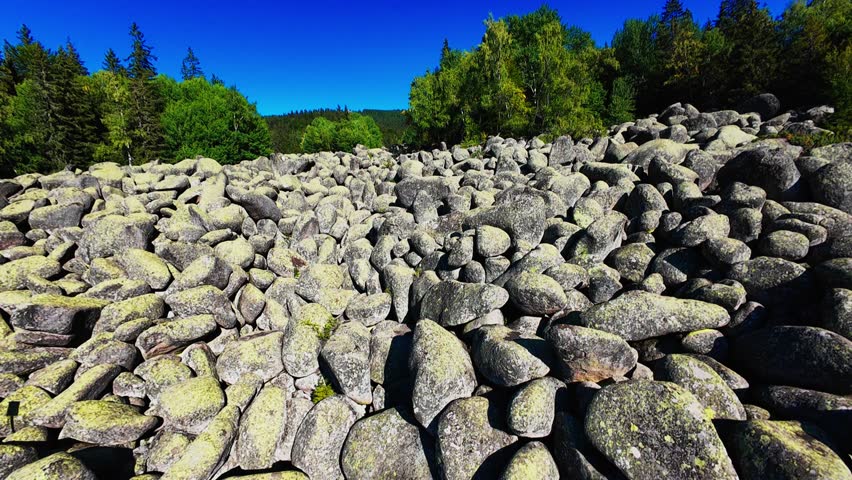 Cinematic FPV 4K drone footage of Rock River in Bulgaria, showing a dynamic aerial flight through the rocky river landscape and scenic Balkan nature.