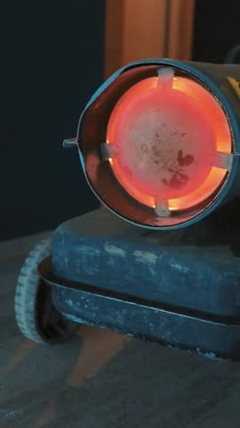 Powerful industrial electric heater warming up epoxy resin