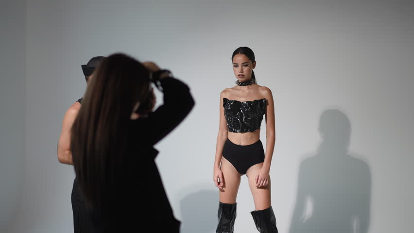 This is a stylish photoshoot that beautifully showcases unique fashion pieces along with expressive modeling