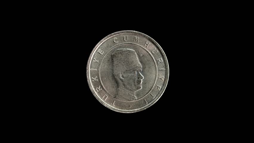 Turkish 100 Bin Lira coin obverse, isolated against a pure black background with copy space