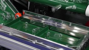 PET preforms. Making of Transparent PET plastic preforms move along automated conveyor belt in modern factory. Industrial production line concept for beverage bottles packaging automation recycling. - Powered by Shutterstock - Get 15% off with code: PIKWIZARD15
