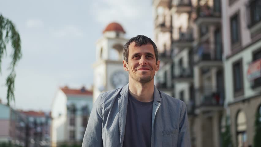 Happy Man with Good Mood Walking on Street