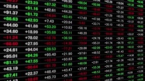 Animated stock trading board displaying real-time fluctuating numbers, symbolizing financial markets, investment dynamics, and the fast pace of economic activity. - Powered by Shutterstock - Get 15% off with code: PIKWIZARD15