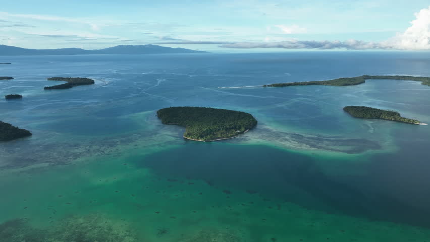 Aerial views over Lola Island at low tide in the Solomon Islands