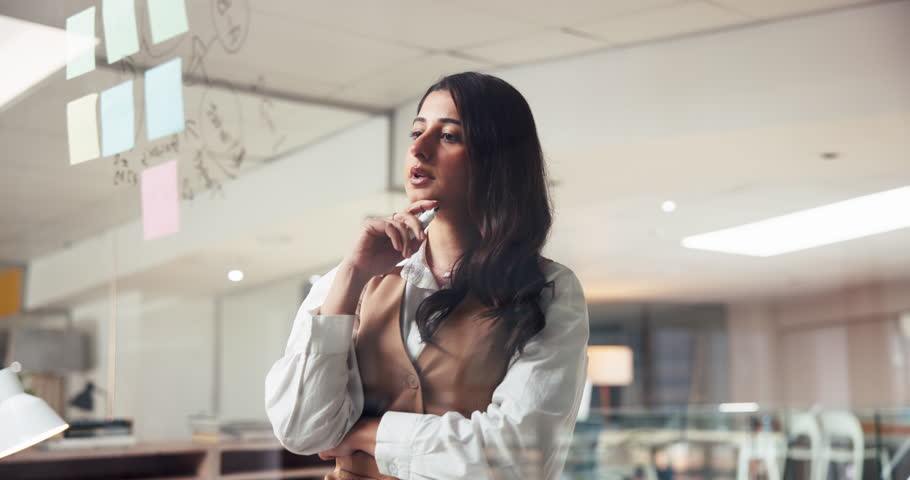 Business woman, writing and glass for brainstorming with sticky note, mind map or thinking for project agenda. Happy person, ideas or schedule with research insight, info or details on board at night