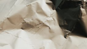 Crumpled foil close-up footage. Silver background and silver texture. . High quality 4k footage - Powered by Shutterstock - Get 15% off with code: PIKWIZARD15
