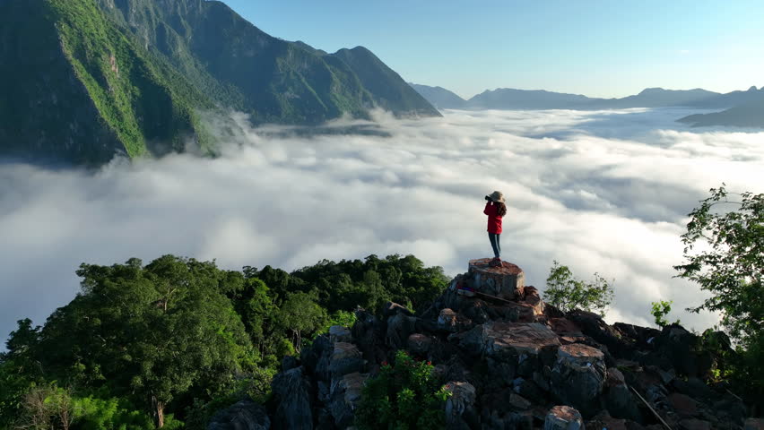 Pha Dang viewpoint with morning mist in Muang Ngoy, Laos.