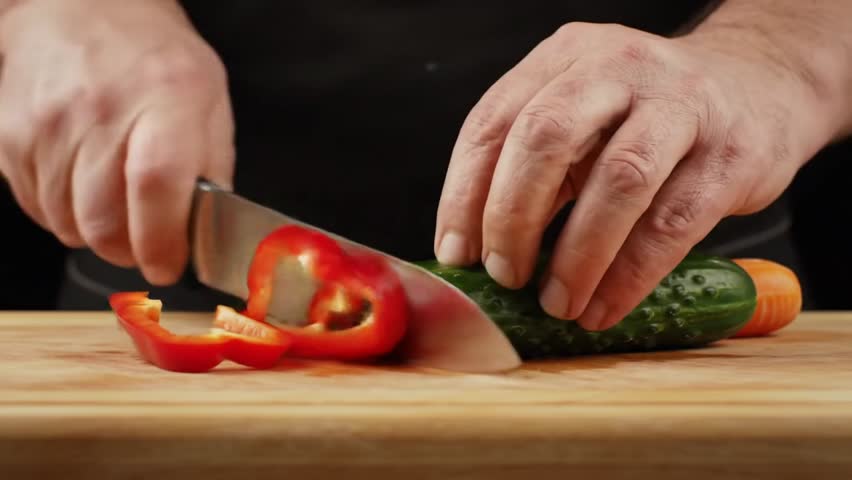 Chef Cutting Vegetables Closeup | Macro closeup of chef’s hands slicing fresh vegetables on cutting board, sharp knife in focus, vibrant colors, high contrast studio lighting, professional food photog