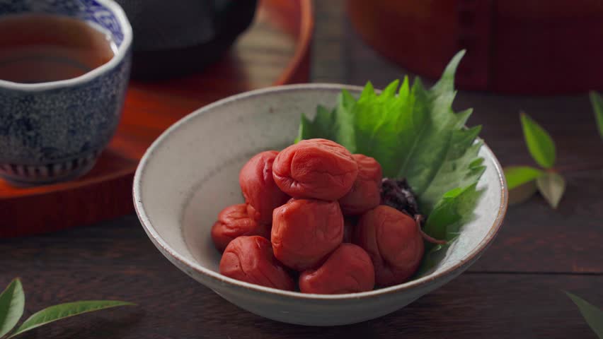 Japanese Umeboshi Pickled Plums in Ceramic Bowl with Shiso