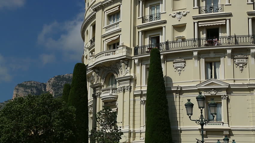 The curved frontage of the Hotel de Paris opposite the Casino in Monte Carlo, Monaco in bright sunlight