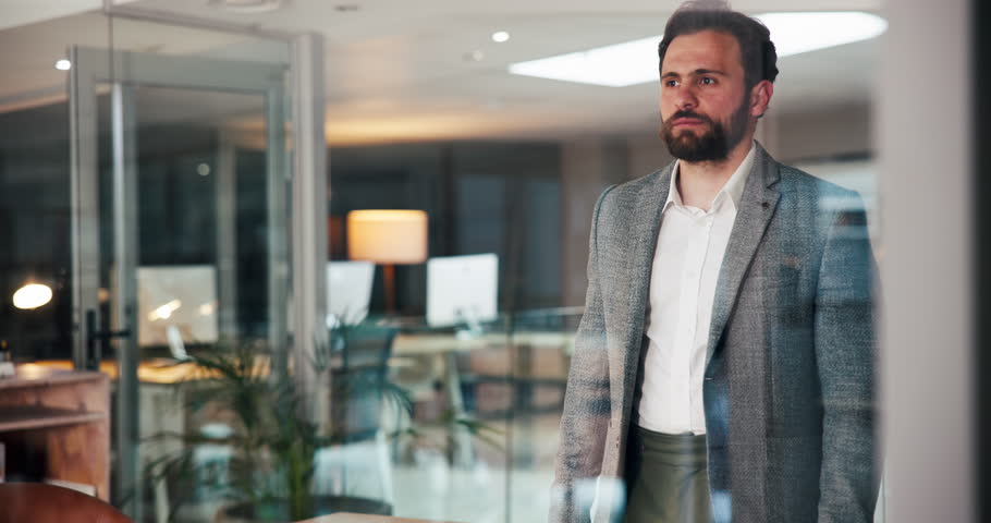 Thinking, crossed arms and man in office at night, reflection or daydream in company success. Corporate, vision and entrepreneur in workplace with window, plan and foresight in KPI achievement.