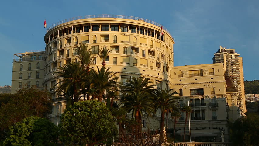 The curved frontage of the Hotel de Paris opposite the Casino in Monte Carlo, Monaco just after sunrise