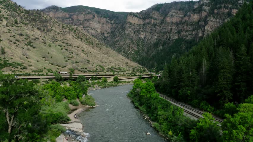 Drone shot of the Colorado River passing through Glenwood Canyon in Colorado.