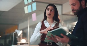 Business people, night and schedule planning with sticky note for team strategy in office. Talking, employees or working late with tablet or flare for tasks, agenda or project ideas on glass board - Powered by Shutterstock - Get 15% off with code: PIKWIZARD15