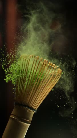 Super Slow Motion Detail Shot of Sprinkling Matcha Powder on Stirrer . Filmed on High Speed Cinematic Camera at 1000 FPS
