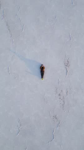 4K Aerial shot of salt flats at rann of Kutch during sunrise. White desert of Kutch in Gujarat, India. Aerial view over the expansive salt marsh of The Great Rann of Kutch. Tranquil Nature landscape.