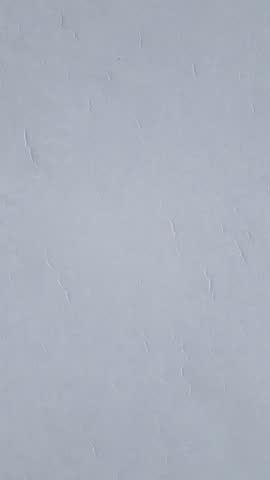 4K Aerial shot of salt flats at rann of Kutch during sunrise. White desert of Kutch in Gujarat, India. Aerial view over the expansive salt marsh of The Great Rann of Kutch. Tranquil Nature landscape.