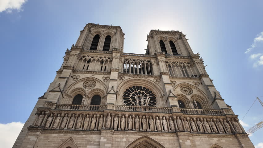 Paris France Notre Dame Cathedral famous gothic church with towers and facade on historic island in the Seine