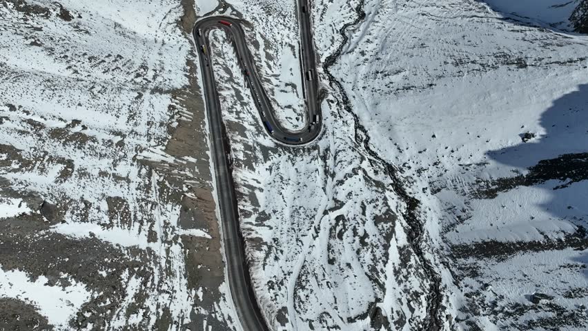 Los Caracoles highway road near Santiago Chile in aerial view. Snow highway road.