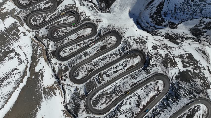 Los Caracoles highway road near Santiago Chile in aerial view. Snow highway road.