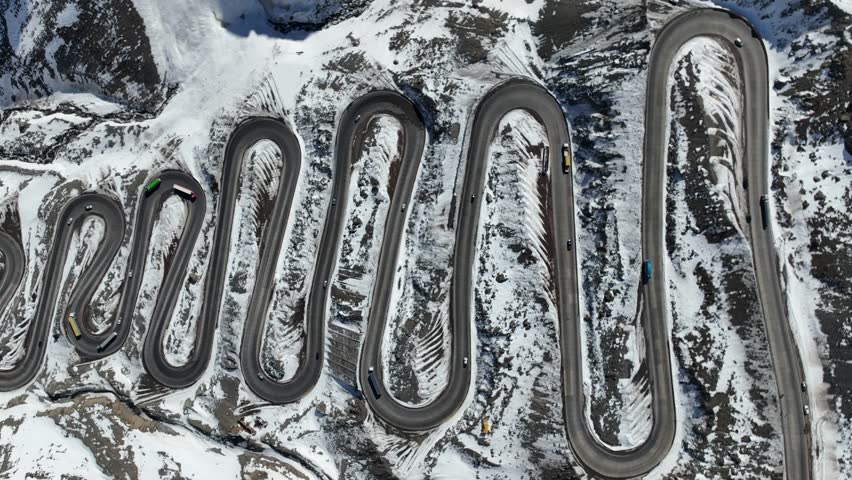 Los Caracoles highway road near Santiago Chile in aerial view. Snow highway road.