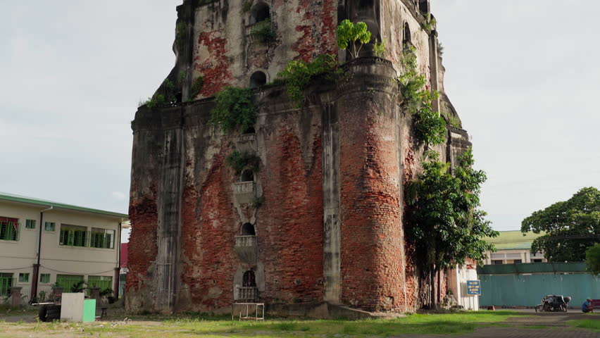 The Sinking Tower in Laoag City is actually the Sinking Bell Tower of St. William Cathedral, a historic Spanish-era structure built in the 17th century. The tower appears to be sinking into the ground