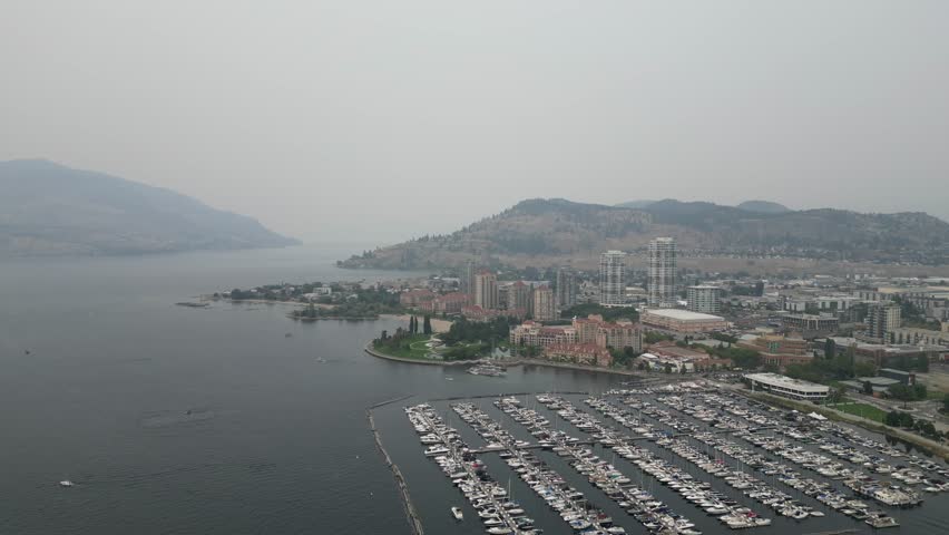 Kelowna bc skyline in summer with wildfire smoke drone aerial