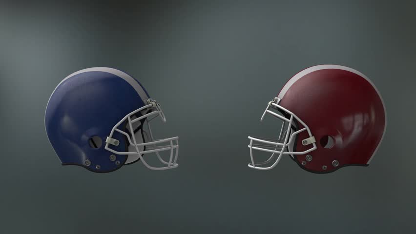 two football helmets collide