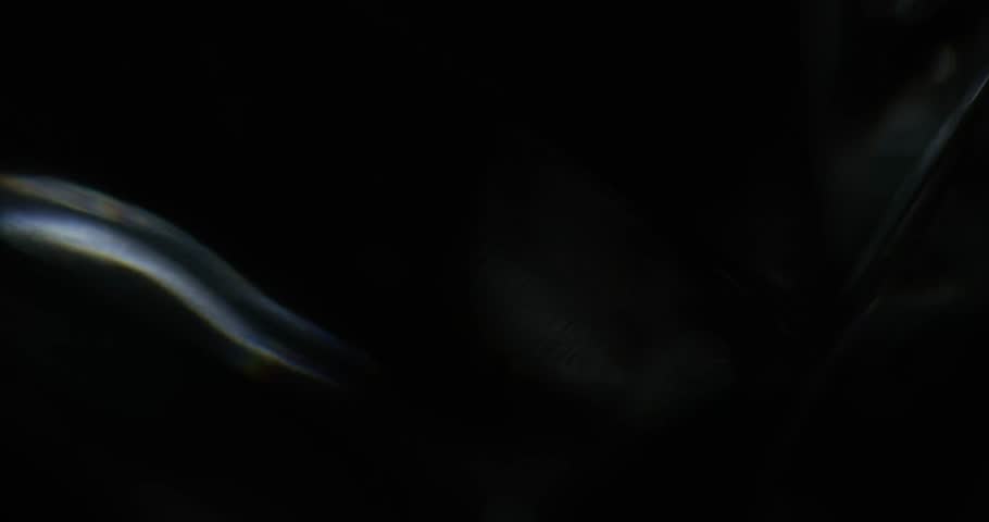 Cinematic abstract motion background featuring pulsing rings and plasma energy flows, ideal for motion graphics, logo reveals, and high-energy video productions with seamless looping
