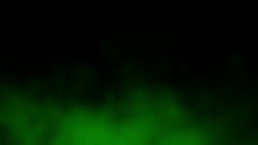 Dense green smoke, fog, or clouds slowly rise from bottom of frame, atmospheric and moody background for fantasy, sci-fi, or cinematic titles